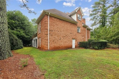 Elegant All-Brick Estate in Prestigious St. Ives Country Club
 on St. Ives Golf and Country Club in Georgia - for sale on GolfHomes.com, golf home, golf lot