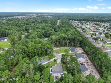 Step into this inviting 3bedroom, 2bath home located in the on Carolina Shores Golf Course in North Carolina - for sale on GolfHomes.com, golf home, golf lot
