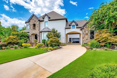 Situated on a beautifully landscaped lot in the coveted gated on Chenal Country Club - Bear Den Mountain in Arkansas - for sale on GolfHomes.com, golf home, golf lot