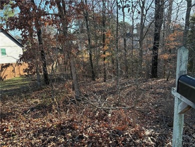 Sewered lot with new home adjacent. Near lakes and golf and on Bella Vista - Metfield Golf Complex and Country Club in Arkansas - for sale on GolfHomes.com, golf home, golf lot