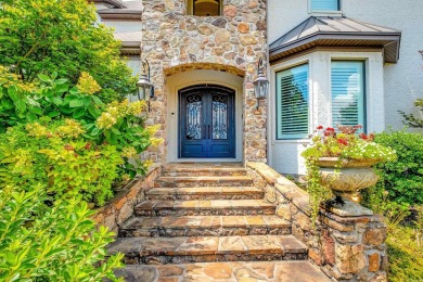 Situated on a beautifully landscaped lot in the coveted gated on Chenal Country Club - Bear Den Mountain in Arkansas - for sale on GolfHomes.com, golf home, golf lot