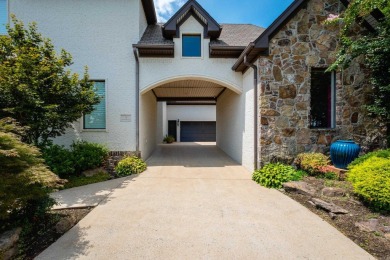 Situated on a beautifully landscaped lot in the coveted gated on Chenal Country Club - Bear Den Mountain in Arkansas - for sale on GolfHomes.com, golf home, golf lot