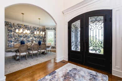 Situated on a beautifully landscaped lot in the coveted gated on Chenal Country Club - Bear Den Mountain in Arkansas - for sale on GolfHomes.com, golf home, golf lot