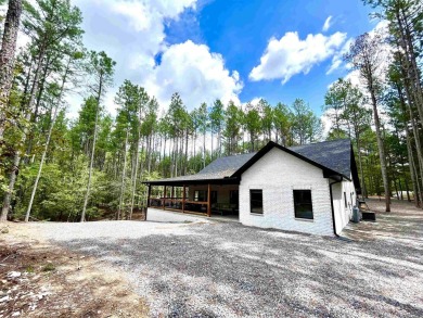 If you want to do outside entertaining give this house a look! on Granada Golf Course in Arkansas - for sale on GolfHomes.com, golf home, golf lot