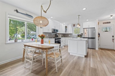 Welcome home to this beautifully renovated cottage style patio on Heron Point Golf Club in South Carolina - for sale on GolfHomes.com, golf home, golf lot