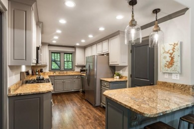 Discover your dream lake retreat on Lake Lanier with this on Crystal Falls Golf Club in Georgia - for sale on GolfHomes.com, golf home, golf lot