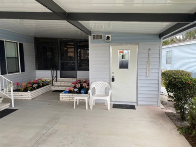 Welcome to this charming, fully furnished home in the desirable on Sabal Springs Golf and Racquet Club in Florida - for sale on GolfHomes.com, golf home, golf lot