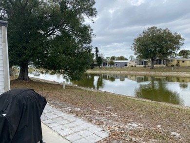 Welcome to this charming, fully furnished home in the desirable on Sabal Springs Golf and Racquet Club in Florida - for sale on GolfHomes.com, golf home, golf lot