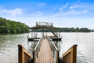 Discover your dream lake retreat on Lake Lanier with this on Crystal Falls Golf Club in Georgia - for sale on GolfHomes.com, golf home, golf lot