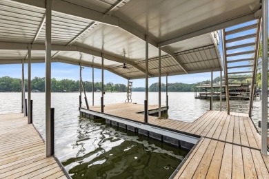 Discover your dream lake retreat on Lake Lanier with this on Crystal Falls Golf Club in Georgia - for sale on GolfHomes.com, golf home, golf lot