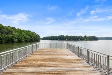Discover your dream lake retreat on Lake Lanier with this on Crystal Falls Golf Club in Georgia - for sale on GolfHomes.com, golf home, golf lot