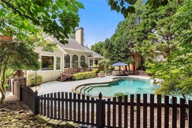 Experience resort-style living perfectly positioned on a private on Woodmont Golf and Country Club in Georgia - for sale on GolfHomes.com, golf home, golf lot