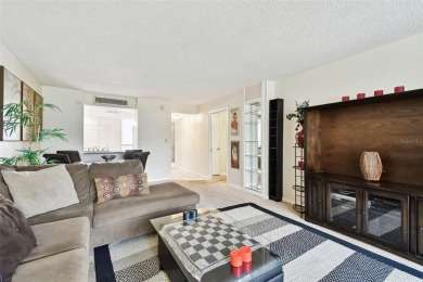 Under contract-accepting backup offers. Welcome to this spacious on Cove Cay Country Club in Florida - for sale on GolfHomes.com, golf home, golf lot
