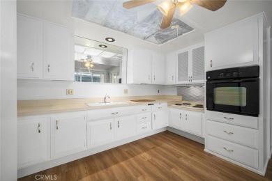 Mutual 7-166E  ~ Come see this 2 bedroom 1 bath, light and on Leisure World Seal Beach Golf Course in California - for sale on GolfHomes.com, golf home, golf lot