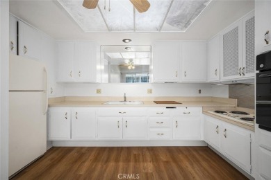 Mutual 7-166E  ~ Come see this 2 bedroom 1 bath, light and on Leisure World Seal Beach Golf Course in California - for sale on GolfHomes.com, golf home, golf lot