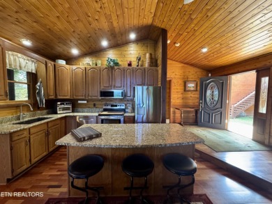 Stunning Log Cabin style Retreat on Norris Lake - Community on The Greens at Deerfield in Tennessee - for sale on GolfHomes.com, golf home, golf lot