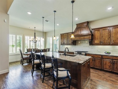 Embrace luxury living in this custom Oakdale home in the golf on The Bridges Golf Club in Texas - for sale on GolfHomes.com, golf home, golf lot