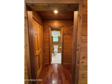 Stunning Log Cabin style Retreat on Norris Lake - Community on The Greens at Deerfield in Tennessee - for sale on GolfHomes.com, golf home, golf lot