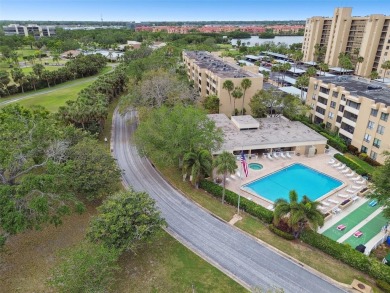 Under contract-accepting backup offers. Welcome to this spacious on Cove Cay Country Club in Florida - for sale on GolfHomes.com, golf home, golf lot