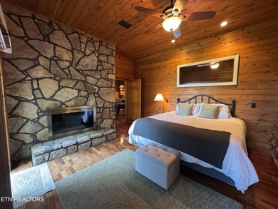 Stunning Log Cabin style Retreat on Norris Lake - Community on The Greens at Deerfield in Tennessee - for sale on GolfHomes.com, golf home, golf lot
