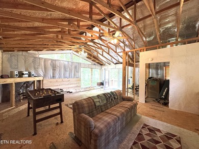 Stunning Log Cabin style Retreat on Norris Lake - Community on The Greens at Deerfield in Tennessee - for sale on GolfHomes.com, golf home, golf lot