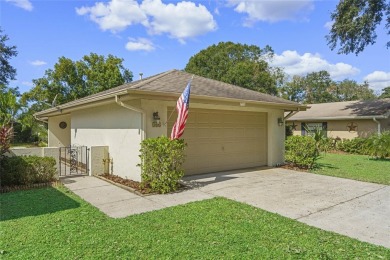 Sited in the desirable golfing community of Cypresswood Golf & on Cypresswood Golf and Country Club in Florida - for sale on GolfHomes.com, golf home, golf lot