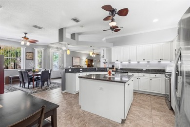 PRIVACY ON CONSERVATION THIS 3 BED/2BATH/2 CAR GARAGE *WITH GOLF on The Groves Golf and Country Club in Florida - for sale on GolfHomes.com, golf home, golf lot