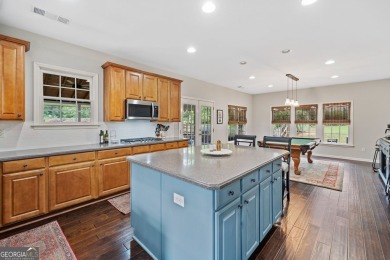 Charming Two-Story Traditional with Private Pond Access on The Golf Club At Bradshaw Farm in Georgia - for sale on GolfHomes.com, golf home, golf lot