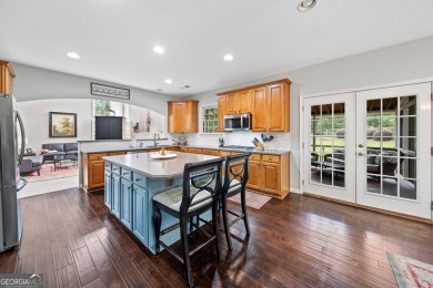 Charming Two-Story Traditional with Private Pond Access on The Golf Club At Bradshaw Farm in Georgia - for sale on GolfHomes.com, golf home, golf lot