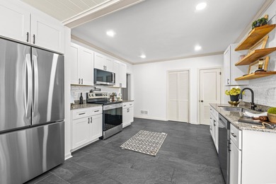 Discover timeless elegance in this 1941 masterpiece overlooking on Capital City Country Club in Florida - for sale on GolfHomes.com, golf home, golf lot