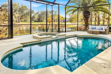 A backyard like this is almost impossible to find -- a private on Queens Harbour Yacht and Country Club in Florida - for sale on GolfHomes.com, golf home, golf lot
