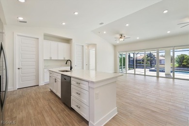 This new construction, move in ready home has it all, a rare on Royal Tee Country Club in Florida - for sale on GolfHomes.com, golf home, golf lot