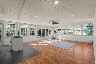 Discover timeless elegance in this 1941 masterpiece overlooking on Capital City Country Club in Florida - for sale on GolfHomes.com, golf home, golf lot