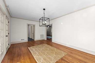 Discover timeless elegance in this 1941 masterpiece overlooking on Capital City Country Club in Florida - for sale on GolfHomes.com, golf home, golf lot