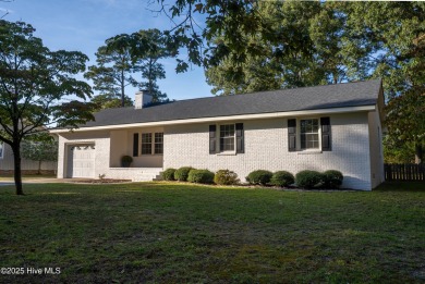 Charming 3-bedroom bungalow located in the desirable Trent Woods on New Bern Golf and Country Club in North Carolina - for sale on GolfHomes.com, golf home, golf lot
