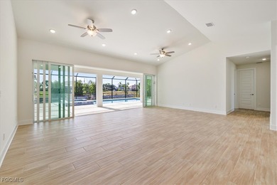 This new construction, move in ready home has it all, a rare on Royal Tee Country Club in Florida - for sale on GolfHomes.com, golf home, golf lot