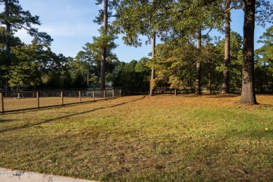 Charming 3-bedroom bungalow located in the desirable Trent Woods on New Bern Golf and Country Club in North Carolina - for sale on GolfHomes.com, golf home, golf lot