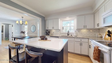 Charming 3-bedroom bungalow located in the desirable Trent Woods on New Bern Golf and Country Club in North Carolina - for sale on GolfHomes.com, golf home, golf lot