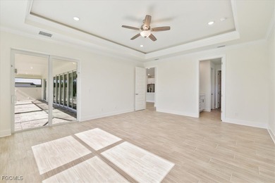 This new construction, move in ready home has it all, a rare on Royal Tee Country Club in Florida - for sale on GolfHomes.com, golf home, golf lot