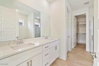 This new construction, move in ready home has it all, a rare on Royal Tee Country Club in Florida - for sale on GolfHomes.com, golf home, golf lot