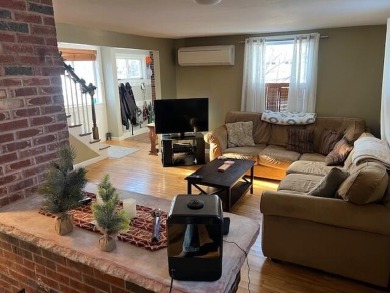 This 3-story home is conveniently located near downtown Bangor on Bangor Municipal Golf Course in Maine - for sale on GolfHomes.com, golf home, golf lot