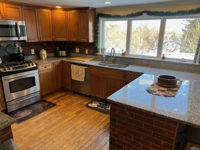 This 3-story home is conveniently located near downtown Bangor on Bangor Municipal Golf Course in Maine - for sale on GolfHomes.com, golf home, golf lot