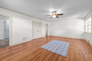 Discover timeless elegance in this 1941 masterpiece overlooking on Capital City Country Club in Florida - for sale on GolfHomes.com, golf home, golf lot