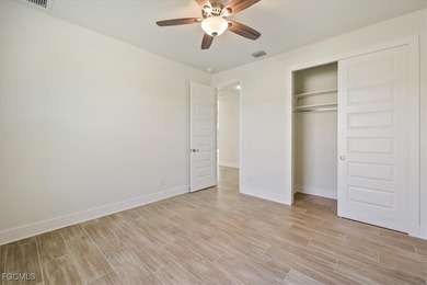 This new construction, move in ready home has it all, a rare on Royal Tee Country Club in Florida - for sale on GolfHomes.com, golf home, golf lot