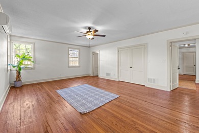 Discover timeless elegance in this 1941 masterpiece overlooking on Capital City Country Club in Florida - for sale on GolfHomes.com, golf home, golf lot