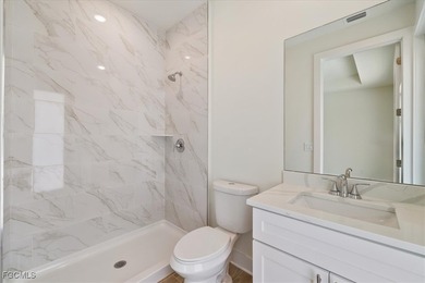 This new construction, move in ready home has it all, a rare on Royal Tee Country Club in Florida - for sale on GolfHomes.com, golf home, golf lot