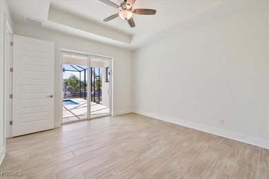 This new construction, move in ready home has it all, a rare on Royal Tee Country Club in Florida - for sale on GolfHomes.com, golf home, golf lot