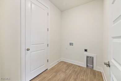 This new construction, move in ready home has it all, a rare on Royal Tee Country Club in Florida - for sale on GolfHomes.com, golf home, golf lot