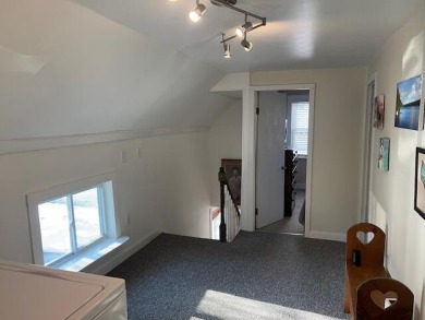 This 3-story home is conveniently located near downtown Bangor on Bangor Municipal Golf Course in Maine - for sale on GolfHomes.com, golf home, golf lot