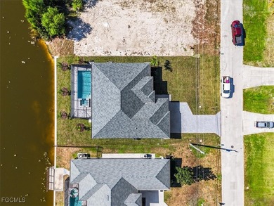 This new construction, move in ready home has it all, a rare on Royal Tee Country Club in Florida - for sale on GolfHomes.com, golf home, golf lot